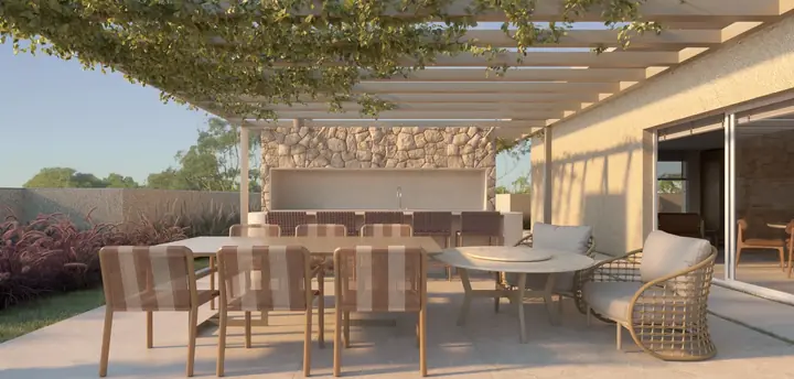 Render do gourmet externo, com pergolado vegetado, bancada em pedra e mesas